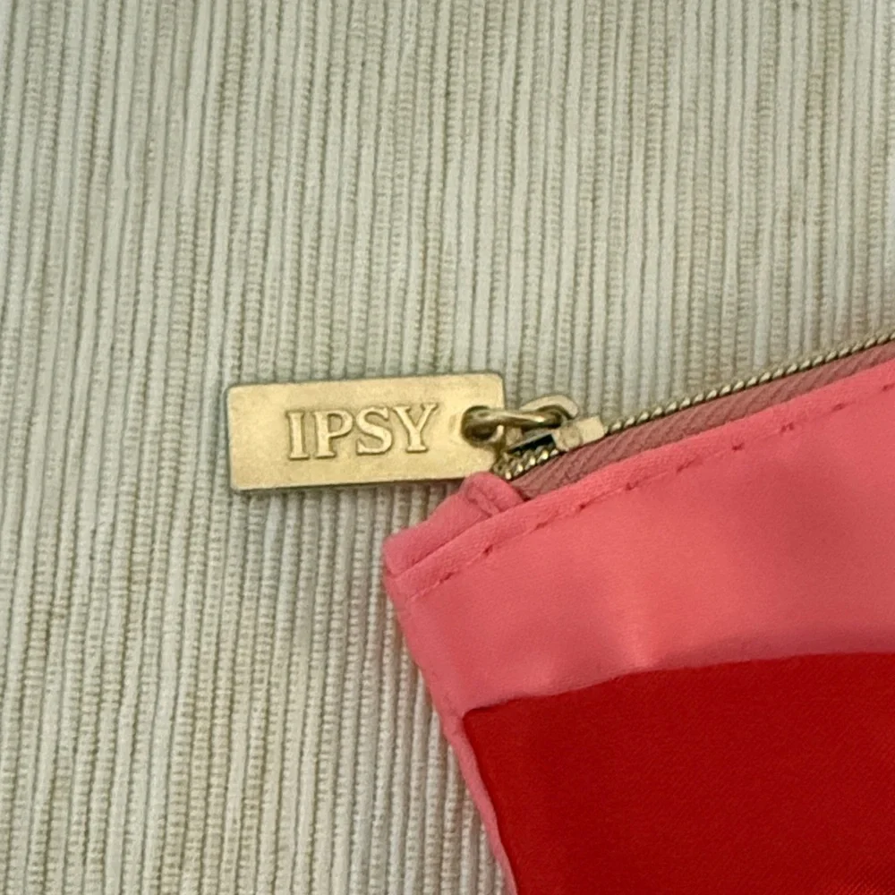 Ipsy Pink and Red Clutch with Gold Tag
